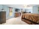 Large main bedroom with multiple windows and plenty of natural light at 12495 Sw 66Th St, Ocala, FL 34481
