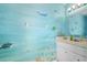 This pool bathroom features an underwater mural, creating a fun and unique space for swimmers at 12495 Sw 66Th St, Ocala, FL 34481