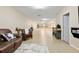 Open rec room is perfect for relaxing with a coffee bar, epoxy floors, and an abundance of space at 12495 Sw 66Th St, Ocala, FL 34481
