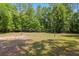 Backyard volleyball court ready for recreational games and outdoor enjoyment on grassy area at 12495 Sw 66Th St, Ocala, FL 34481