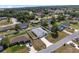 Aerial view of a property featuring a well-manicured lawn and perimeter white fencing at 14055 Sw 30Th Terrace Rd, Ocala, FL 34473