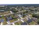 An aerial view showcases this home in a residential neighborhood, highlighting its expansive lot at 14055 Sw 30Th Terrace Rd, Ocala, FL 34473
