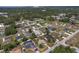 A high aerial view showcases the property's location in a mature tree-lined neighborhood at 14055 Sw 30Th Terrace Rd, Ocala, FL 34473