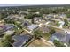 Bird's eye view of a property with a tidy yard, showcasing its desirable location within a residential community at 14055 Sw 30Th Terrace Rd, Ocala, FL 34473