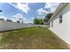 Spacious backyard featuring a well-maintained lawn and white perimeter fence at 14055 Sw 30Th Terrace Rd, Ocala, FL 34473