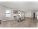 Spacious dining room featuring a stylish table set with elegant chairs and light wood flooring at 14055 Sw 30Th Terrace Rd, Ocala, FL 34473