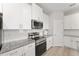Kitchen area featuring stainless steel appliances, granite countertops, and white subway tile backsplash at 14055 Sw 30Th Terrace Rd, Ocala, FL 34473