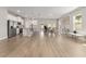 Bright, open-concept living area with modern finishes, light wood floors, and ample natural light at 14055 Sw 30Th Terrace Rd, Ocala, FL 34473