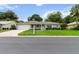Charming single-story home featuring a well-manicured lawn, neutral paint, and a welcoming front porch at 14481 Sw 112Th Cir, Dunnellon, FL 34432