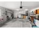 Spacious garage with ample storage, shelving and utility sink at 14481 Sw 112Th Cir, Dunnellon, FL 34432