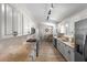 Stylish kitchen featuring stainless steel appliances, granite countertops, and ample cabinet space at 14481 Sw 112Th Cir, Dunnellon, FL 34432