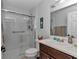 Clean bathroom featuring a shower with sliding glass door and a modern vanity at 16969 Sw 40Th Cir, Ocala, FL 34473