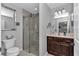 Modern bathroom featuring a glass-enclosed shower and stylish vanity, offering a spa-like experience at 16969 Sw 40Th Cir, Ocala, FL 34473