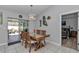 Bright dining area with access to outdoor patio, ideal for indoor-outdoor entertaining and Gathering gatherings at 16969 Sw 40Th Cir, Ocala, FL 34473