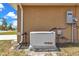 Exterior shot of house showing whole house generator and utility infrastructure at 16969 Sw 40Th Cir, Ocala, FL 34473
