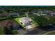 Aerial view of a single-Gathering home with well-maintained landscaping and a long driveway at 4225 Sw 57Th Ave, Ocala, FL 34474