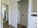 Interior view of a closet with built-in shelving, storage and sliding doors at 4345 Nw 27Th Pl, Ocala, FL 34482