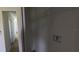 Bright closet with a wire rack shelf, hardware, and neutral paint at 4345 Nw 27Th Pl, Ocala, FL 34482
