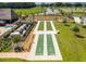 View of the community amenities, including tennis and shuffleboard courts at 4345 Nw 27Th Pl, Ocala, FL 34482