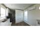 Bright kitchen featuring white cabinetry, stainless steel appliances, and natural wood-look flooring at 4345 Nw 27Th Pl, Ocala, FL 34482