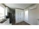 Bright kitchen features white cabinetry, stainless steel appliances, and light wood flooring at 4345 Nw 27Th Pl, Ocala, FL 34482