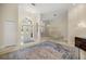 Bright foyer featuring a chandelier, tile flooring, and a decorative front door with sidelights at 4812 Se 12Th Pl, Ocala, FL 34471