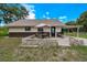 Charming single-story home features a covered carport, cozy front patio, and a manicured lawn at 531 Ne 142Nd Ave, Silver Springs, FL 34488