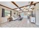 Bright living room with tile flooring, a comfortable sofa, and plenty of natural light from multiple windows at 531 Ne 142Nd Ave, Silver Springs, FL 34488