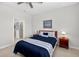 Well-lit bedroom with a neat closet space and stylish interior design at 6051 Sw 93Rd Cir, Ocala, FL 34481