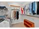 Spacious walk-in closet featuring custom shelving and ample hanging space for organized storage at 6051 Sw 93Rd Cir, Ocala, FL 34481