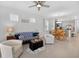 Open concept living area connects the living room, dining area, and kitchen, great for entertaining guests at 6051 Sw 93Rd Cir, Ocala, FL 34481