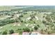 Overhead view of Juliette Falls golf course with lush green fairways and challenging sand traps at 7210 Sw 179 Ct, Dunnellon, FL 34432