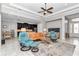 Spacious living room with an open layout and modern furnishings at 7210 Sw 179 Ct, Dunnellon, FL 34432