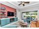 Stylish living room featuring a built-in entertainment center with a fireplace at 7210 Sw 179 Ct, Dunnellon, FL 34432