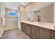 Well-appointed bathroom showcasing a large vanity with double sinks and a luxurious walk-in shower at 7750 Sw 87Th Ave, Ocala, FL 34481
