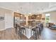 Gourmet kitchen features stainless steel appliances, a large center island with bar seating and ample cabinet space at 7750 Sw 87Th Ave, Ocala, FL 34481