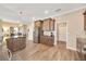 Functional kitchen with stainless steel refrigerator, granite counters, and wood cabinets at 7750 Sw 87Th Ave, Ocala, FL 34481