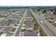 Aerial view of a residential neighborhood with neatly arranged homes and streets at 8110 Sw 59Th Ter, Ocala, FL 34476