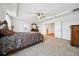 The primary bedroom has a tray ceiling and an ensuite bath at 8110 Sw 59Th Ter, Ocala, FL 34476