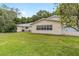 Lush backyard featuring a well-manicured lawn, perfect for outdoor enjoyment at 8745 Sw 92Nd St # B, Ocala, FL 34481