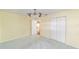 Light-filled bedroom showcasing a modern ceiling fan and standard double-door closet at 8745 Sw 92Nd St # B, Ocala, FL 34481