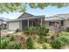 Charming home with a well-manicured lawn, attached garage, and a covered front porch at 8745 Sw 92Nd St # B, Ocala, FL 34481