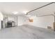 Spacious garage with laundry area and storage, providing functionality and organization at 8745 Sw 92Nd St # B, Ocala, FL 34481