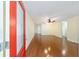 View of the entry and living room featuring hardwood floors, a ceiling fan, and neutral walls at 8745 Sw 92Nd St # B, Ocala, FL 34481