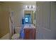 Functional bathroom featuring a tub-shower combination, vanity with ample storage, and neutral decor at 9068 Se 120Th Loop, Summerfield, FL 34491