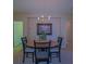Elegant dining area featuring a chandelier and view to multiple rooms at 9068 Se 120Th Loop, Summerfield, FL 34491