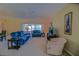 Inviting living room featuring comfortable seating and an open layout at 9068 Se 120Th Loop, Summerfield, FL 34491