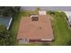 Overhead view showcasing the roof and landscaping around the house at 9891 Se 138Th Loop, Summerfield, FL 34491