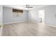 Large main bedroom with en suite bath, ceiling fan and large window bringing in lots of natural light at 9891 Se 138Th Loop, Summerfield, FL 34491