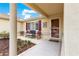 Inviting front porch with seating area at 9891 Se 138Th Loop, Summerfield, FL 34491